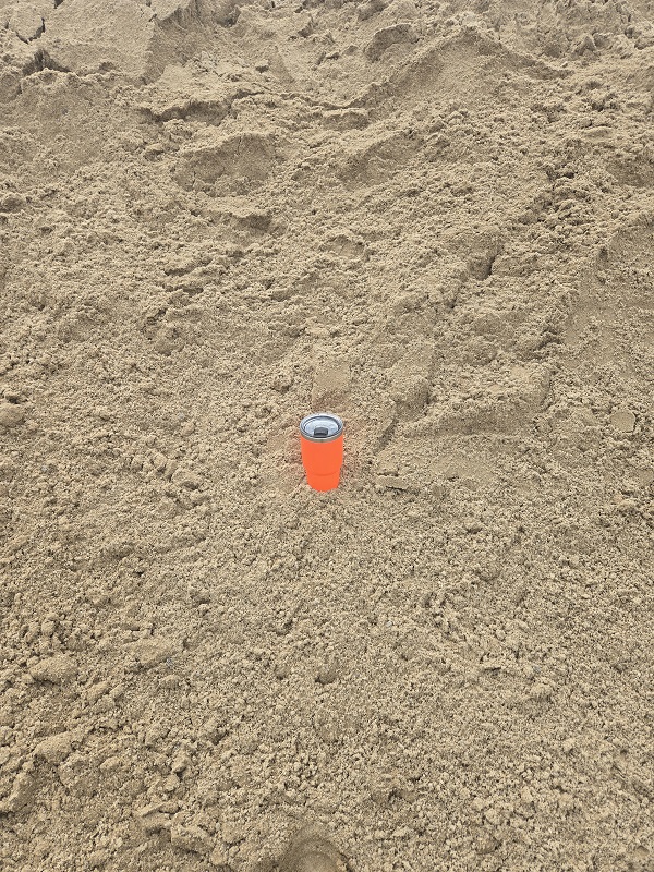 Get sand near you from Avery Excavating. Thermos for size reference